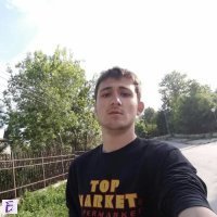 николай