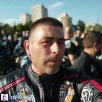 николай